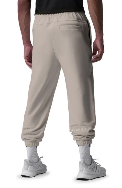 Shop Asrv Tech-terry™ Oversize Joggers In Sand Smoke