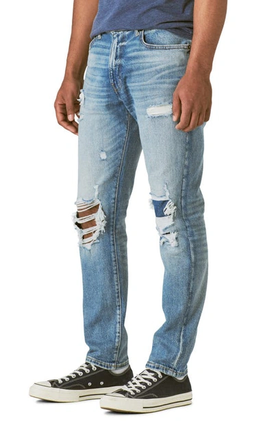 Shop Lucky Brand 411 Athletic Ripped Tapered Leg Jeans In Wagener