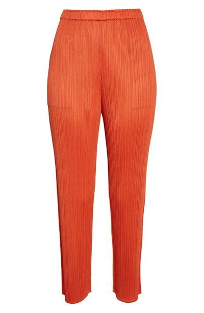 Shop Issey Miyake Monthly Colors November Pleated Crop Straight Leg Pants In Orange Red