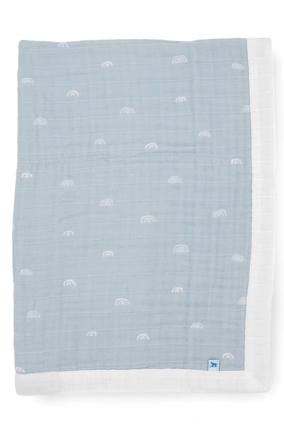 Shop Little Unicorn Cotton Muslin Baby Quilt In Blue Rainbow