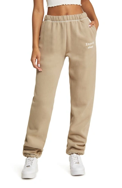Shop The Mayfair Group Empathy Always Embroidered Sweatpants In Tan