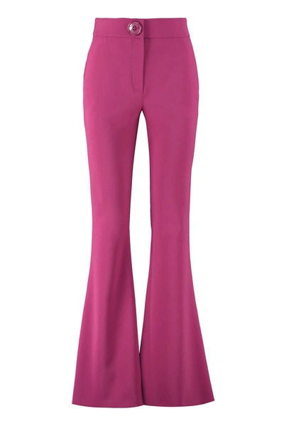 Shop Moschino Flared Crêpe Trousers In Purple
