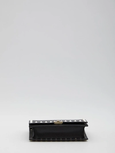 Shop Valentino Small Rockstud Bag In Black