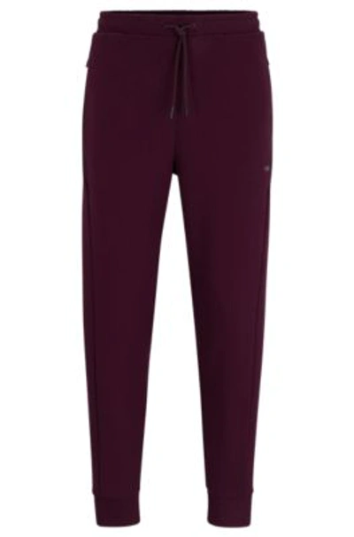 Shop Hugo Boss Cotton-blend Tracksuit Bottoms With Hd Logo Print In Light Pink