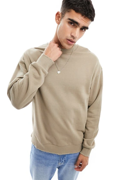 Shop Asos Design Raw Edge Oversize Sweatshirt In Beige