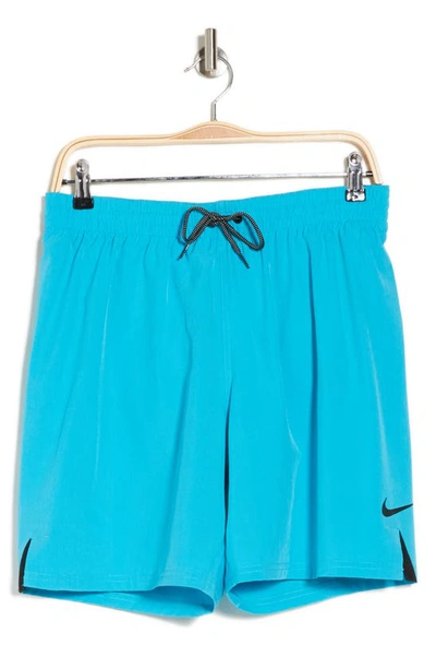 Shop Nike 7" Volley Swim Trunks In Blue Lightning