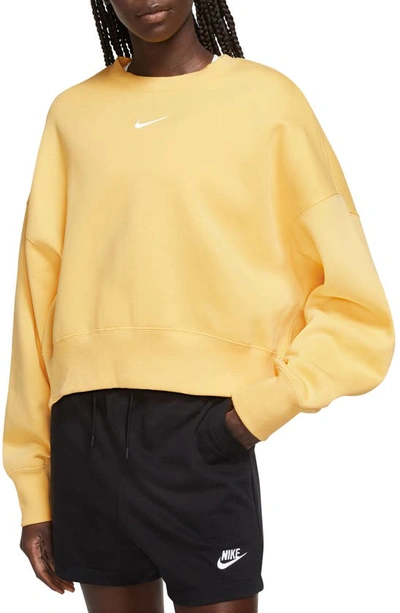 Shop Nike Phoenix Fleece Crewneck Sweatshirt In Topaz Gold/ Sail