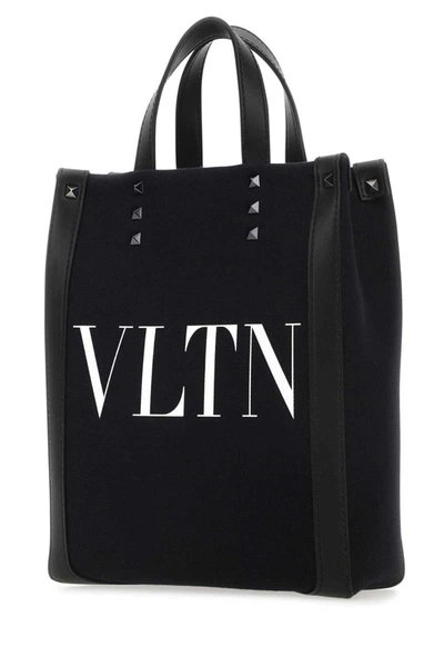 Shop Valentino Garavani Handbags. In Nerobianco