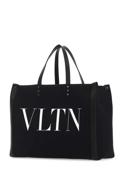 Shop Valentino Garavani Handbags. In Nerobianco