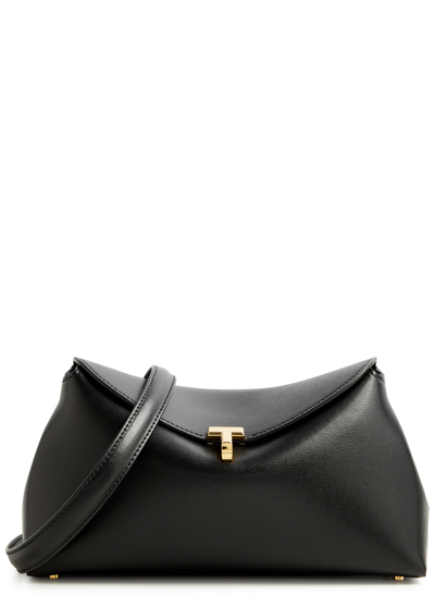 Shop Totême T-lock Leather Clutch In Black
