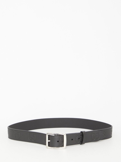Shop Gucci Gg Embossed Buckle Belt In Black