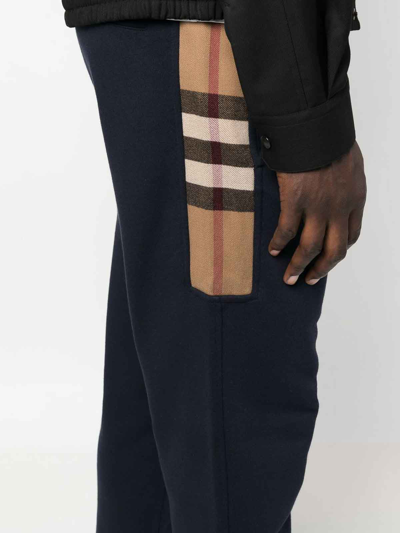 Shop Burberry Check-panelled Track Pants In Blue