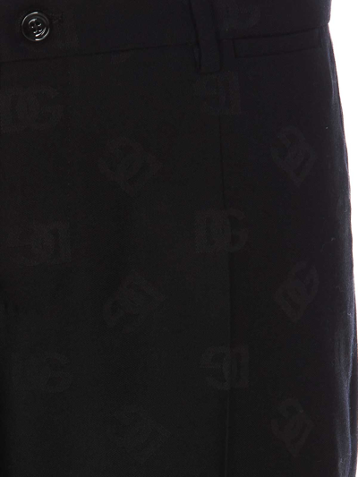 Shop Dolce & Gabbana Dg Logo Jacquard Stretch Wool Pants In Black
