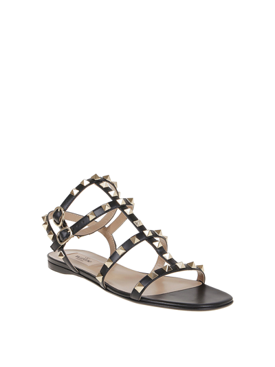 Valentino Garavani Rockstud Flat Calfskin Sandal With Straps Woman Black 40 In Black
