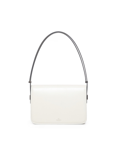 Shop Valentino Letter Shoulder Bag In White
