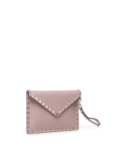 Shop Valentino Rockstud Flat Pochette In Calfskin In Nude & Neutrals