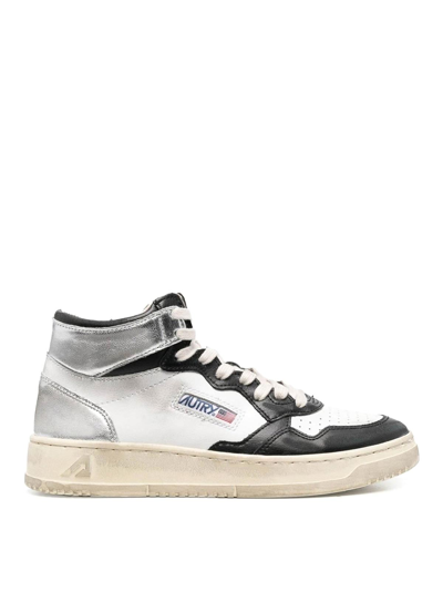 Shop Autry Sneakers In White