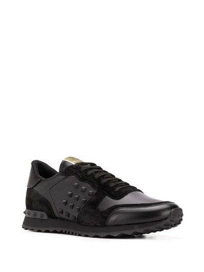 Shop Valentino Rockstud Sneaker In Negro