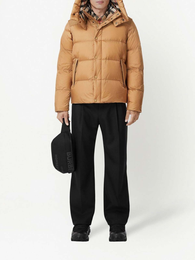 Shop Burberry Detachable-sleeves Hooded Puffer Jacket In Beis