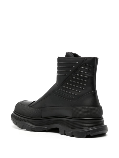 Shop Alexander Mcqueen Tread Slick Leather Ankle Boots In Black