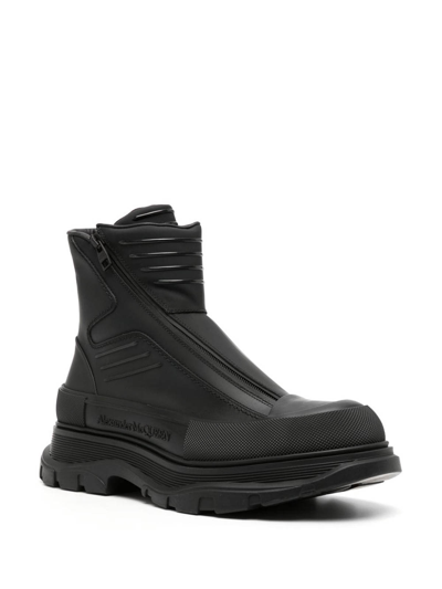 Shop Alexander Mcqueen Tread Slick Leather Ankle Boots In Black