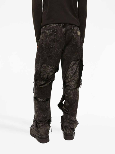 Shop Dolce & Gabbana Distressed Effect Jeans In Black