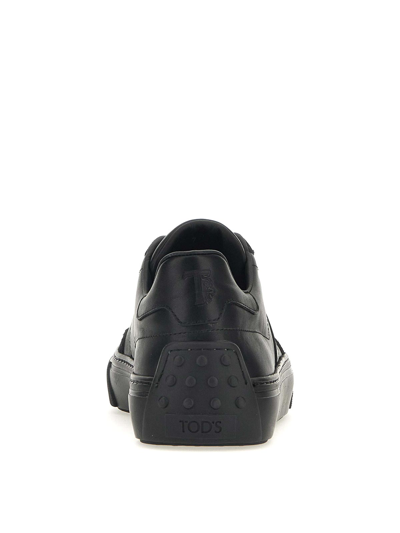 Shop Tod's Leather Sneakers In Black