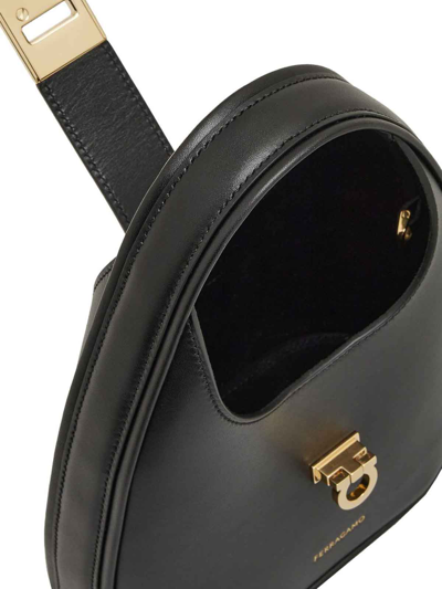 Shop Ferragamo Mini Leather Hobo Bag In Black