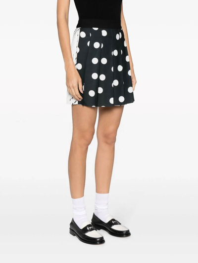 Shop Msgm Polka Dot Pleated Mini Skirt In White