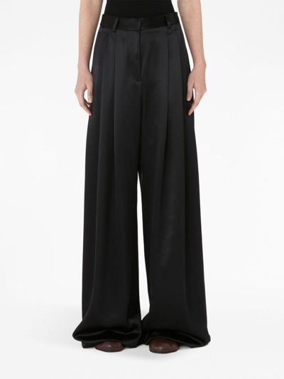 Jw Anderson Wide-leg Pleated Pants In Black