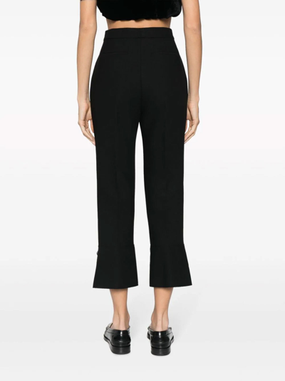 Shop Msgm Pressed-crease High-waisted Trousers In Black