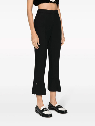 Shop Msgm Pressed-crease High-waisted Trousers In Black