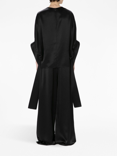 Shop Jw Anderson Atin-finish Pleated Blouse In Black