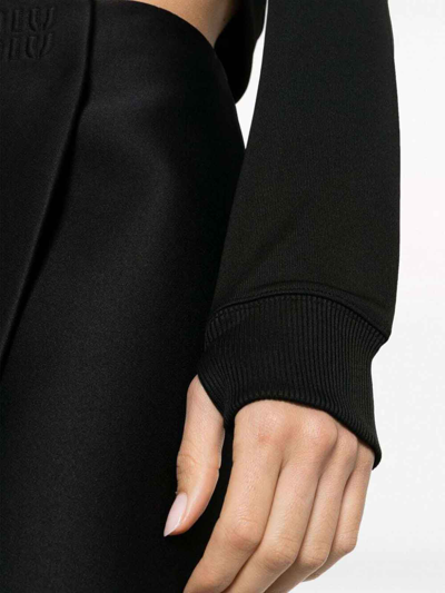 Shop Courrèges Cropped Tracksuit Interlock Jacket In Negro