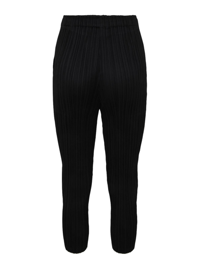 Shop Issey Miyake Casual Trousers In Black