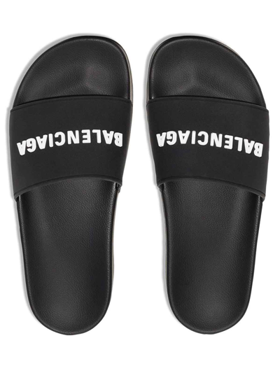 Balenciaga Logo-embossed Rubber Slides In Black