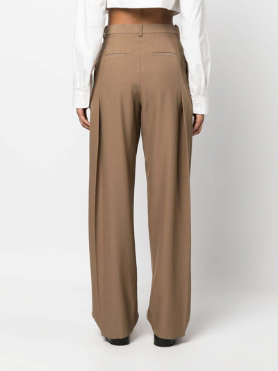 Shop Victoria Beckham Cotton-blend Pleated Pants In Brown