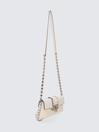 Shop Valentino Rockstud Bag In Brushed Leather In White