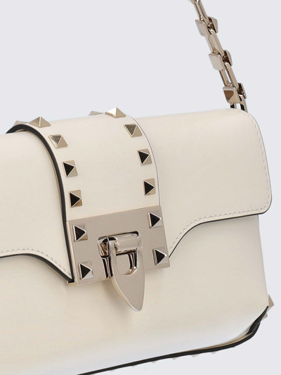 Shop Valentino Rockstud Bag In Brushed Leather In White