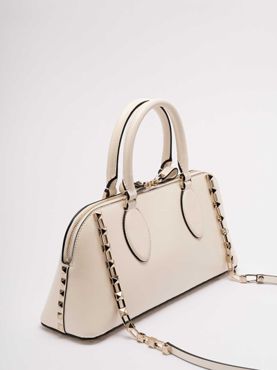 Shop Valentino `rockstud` Medium Leather Duffle Bag In White