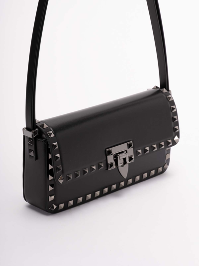 Shop Valentino `rockstud E/w` Leather Shoulder Bag In Black