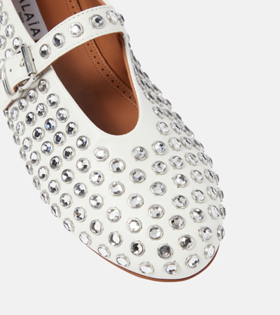 Shop Alaïa Crystal-embellished Leather Ballet Flats In White