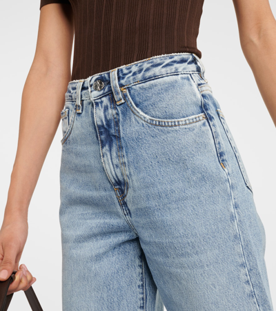 Shop Totême High-rise Wide-leg Jeans In Blue