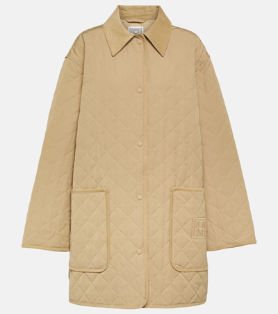 Shop Totême Oversized Quilted Jacket In Biscuit 