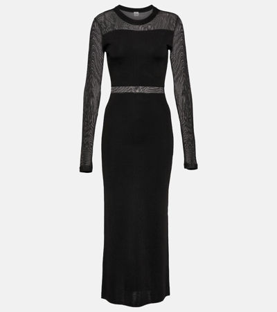 Shop Totême Semi-sheer Knitted Maxi Dress In Black