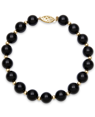 Shop Macy's Onyx Bead Bracelet (8mm) In 10k Gold