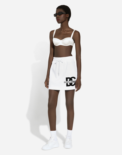 Dolce & Gabbana Jersey Miniskirt With Dg Logo Patch In ホワイト