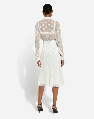 Dolce & Gabbana All-over Logo Sheer Midi Skirt In ホワイト