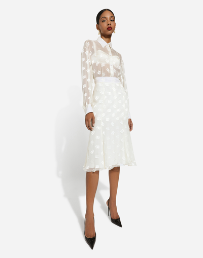 Dolce & Gabbana All-over Logo Sheer Midi Skirt In ホワイト