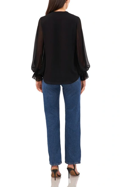 Shop Vince Camuto Ruffle Cuff Split Neck Top In Rich Black